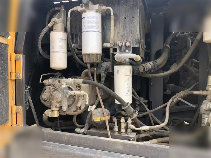 VOLVO EW145B - Bager na kotačima: slika VOLVO EW145B - Bager na kotačima VOLVO EW145B - Bager na kotačima: slika VOLVO EW145B - Bager na kotačima