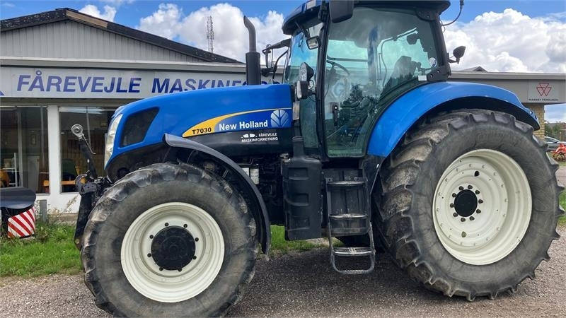 New Holland T7030 - Traktor: slika New Holland T7030 - Traktor New Holland T7030 - Traktor: slika New Holland T7030 - Traktor