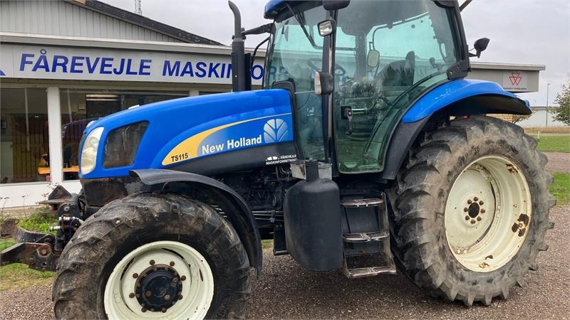New Holland TS 115 A - Traktor: slika New Holland TS 115 A - Traktor New Holland TS 115 A - Traktor: slika New Holland TS 115 A - Traktor