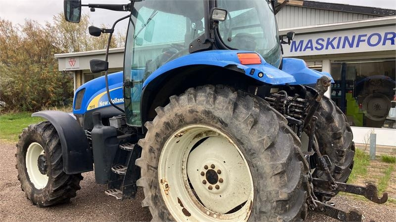 New Holland TS 115 A - Traktor: slika New Holland TS 115 A - Traktor New Holland TS 115 A - Traktor: slika New Holland TS 115 A - Traktor