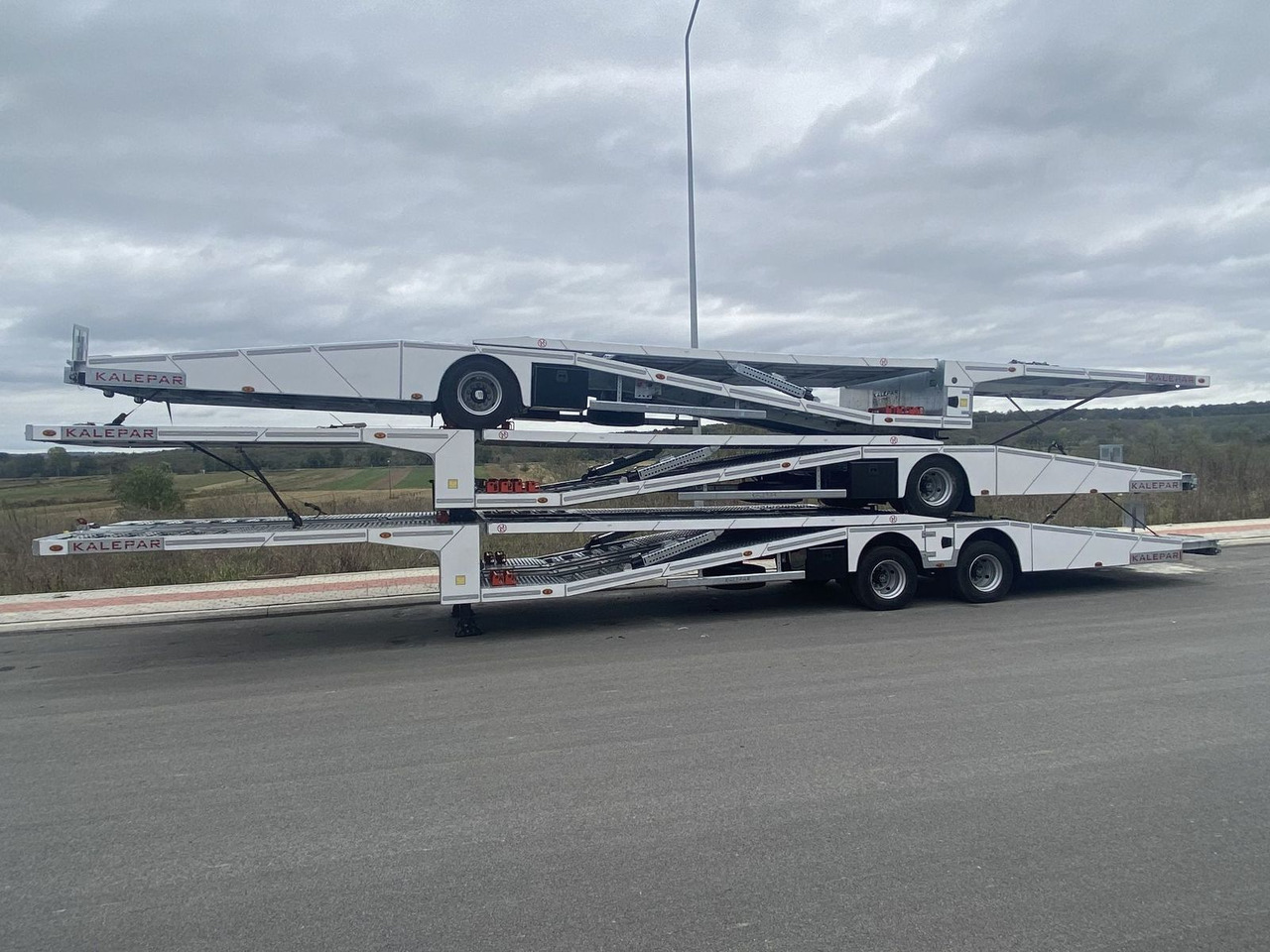 KALEPAR KLP119V4 4er-Autotransporter 1xAchse VDI - Poluprikolica za prijevoz automobila: slika KALEPAR KLP119V4 4er-Autotransporter 1xAchse VDI - Poluprikolica za prijevoz automobila KALEPAR KLP119V4 4er-Autotransporter 1xAchse VDI - Poluprikolica za prijevoz automobila: slika KALEPAR KLP119V4 4er-Autotransporter 1xAchse VDI - Poluprikolica za prijevoz automobila