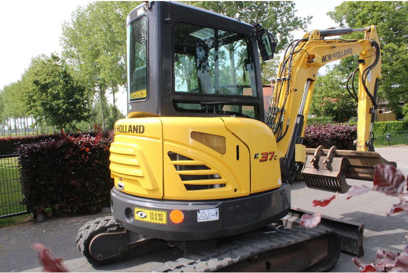 New Holland E37C binnendraaier - Mini kran: slika New Holland E37C binnendraaier - Mini kran New Holland E37C binnendraaier - Mini kran: slika New Holland E37C binnendraaier - Mini kran