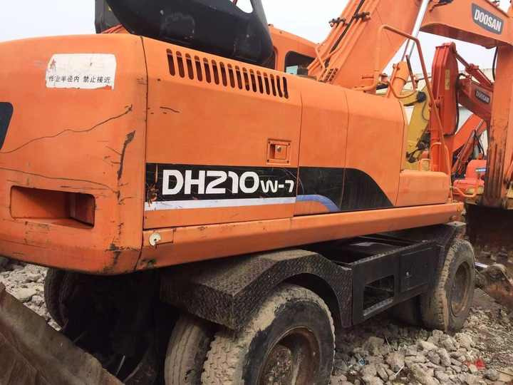 Used Digger Doosan Dh210w-7 Construction Machinery Construction Digger Used Doosan Dh210w-7 Cheap Excavator - Bager na kotačima: slika Used Digger Doosan Dh210w-7 Construction Machinery Construction Digger Used Doosan Dh210w-7 Cheap Excavator - Bager na kotačima Used Digger Doosan Dh210w-7 Construction Machinery Construction Digger Used Doosan Dh210w-7 Cheap Excavator - Bager na kotačima: slika Used Digger Doosan Dh210w-7 Construction Machinery Construction Digger Used Doosan Dh210w-7 Cheap Excavator - Bager na kotačima