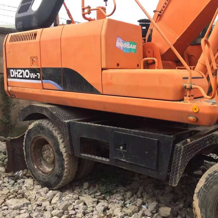 Used Digger Doosan Dh210w-7 Construction Machinery Construction Digger Used Doosan Dh210w-7 Cheap Excavator - Bager na kotačima: slika Used Digger Doosan Dh210w-7 Construction Machinery Construction Digger Used Doosan Dh210w-7 Cheap Excavator - Bager na kotačima Used Digger Doosan Dh210w-7 Construction Machinery Construction Digger Used Doosan Dh210w-7 Cheap Excavator - Bager na kotačima: slika Used Digger Doosan Dh210w-7 Construction Machinery Construction Digger Used Doosan Dh210w-7 Cheap Excavator - Bager na kotačima