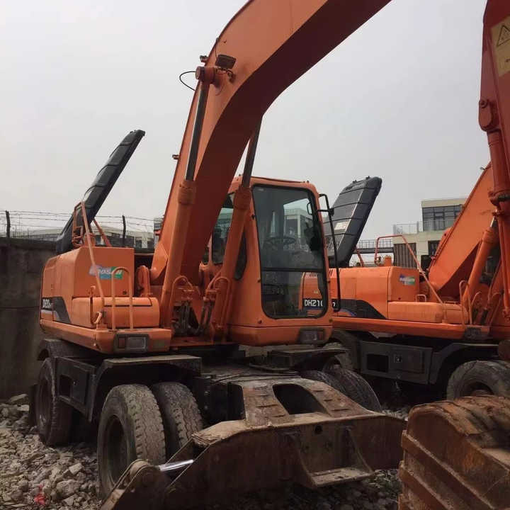 Used Digger Doosan Dh210w-7 Construction Machinery Construction Digger Used Doosan Dh210w-7 Cheap Excavator - Bager na kotačima: slika Used Digger Doosan Dh210w-7 Construction Machinery Construction Digger Used Doosan Dh210w-7 Cheap Excavator - Bager na kotačima Used Digger Doosan Dh210w-7 Construction Machinery Construction Digger Used Doosan Dh210w-7 Cheap Excavator - Bager na kotačima: slika Used Digger Doosan Dh210w-7 Construction Machinery Construction Digger Used Doosan Dh210w-7 Cheap Excavator - Bager na kotačima
