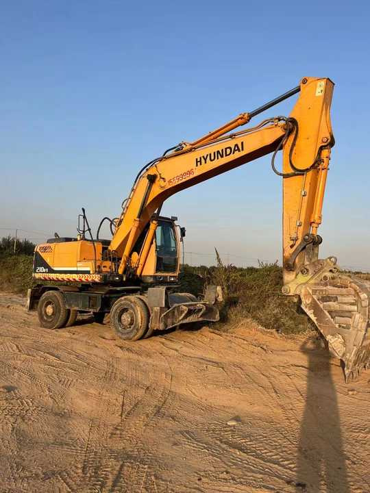 Well-Maintained Hyundai 210-9Used Wheel Excavator Construction Machine | No Major Repairs | Price Negotiable - Bager na kotačima: slika Well-Maintained Hyundai 210-9Used Wheel Excavator Construction Machine | No Major Repairs | Price Negotiable - Bager na kotačima Well-Maintained Hyundai 210-9Used Wheel Excavator Construction Machine | No Major Repairs | Price Negotiable - Bager na kotačima: slika Well-Maintained Hyundai 210-9Used Wheel Excavator Construction Machine | No Major Repairs | Price Negotiable - Bager na kotačima