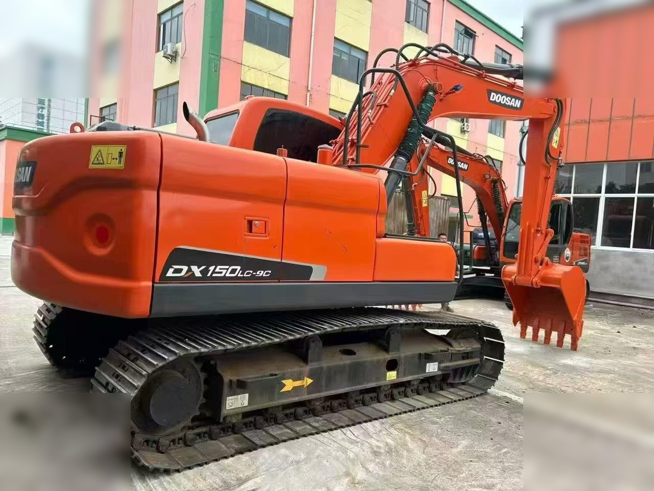 DOOSAN DX150W-9C - Bager na kotačima: slika DOOSAN DX150W-9C - Bager na kotačima DOOSAN DX150W-9C - Bager na kotačima: slika DOOSAN DX150W-9C - Bager na kotačima