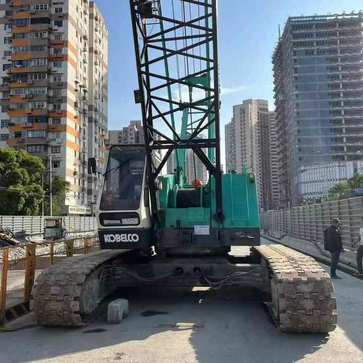 Kobelco 7055-2 Mobile Crane Truck Japan Made Used Heavy Earthmoving Equipment Crane Truck in Good Condition - Dizalica gusjeničar: slika Kobelco 7055-2 Mobile Crane Truck Japan Made Used Heavy Earthmoving Equipment Crane Truck in Good Condition - Dizalica gusjeničar Kobelco 7055-2 Mobile Crane Truck Japan Made Used Heavy Earthmoving Equipment Crane Truck in Good Condition - Dizalica gusjeničar: slika Kobelco 7055-2 Mobile Crane Truck Japan Made Used Heavy Earthmoving Equipment Crane Truck in Good Condition - Dizalica gusjeničar