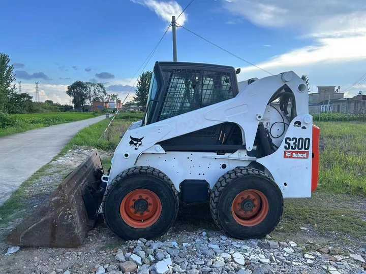 Used Bob Cat Bob Cat S300 Used Mini Skid Steer Wheel Loader Multifunctional Track Loaders Bobcat S300 - Mini utovarivač: slika Used Bob Cat Bob Cat S300 Used Mini Skid Steer Wheel Loader Multifunctional Track Loaders Bobcat S300 - Mini utovarivač Used Bob Cat Bob Cat S300 Used Mini Skid Steer Wheel Loader Multifunctional Track Loaders Bobcat S300 - Mini utovarivač: slika Used Bob Cat Bob Cat S300 Used Mini Skid Steer Wheel Loader Multifunctional Track Loaders Bobcat S300 - Mini utovarivač