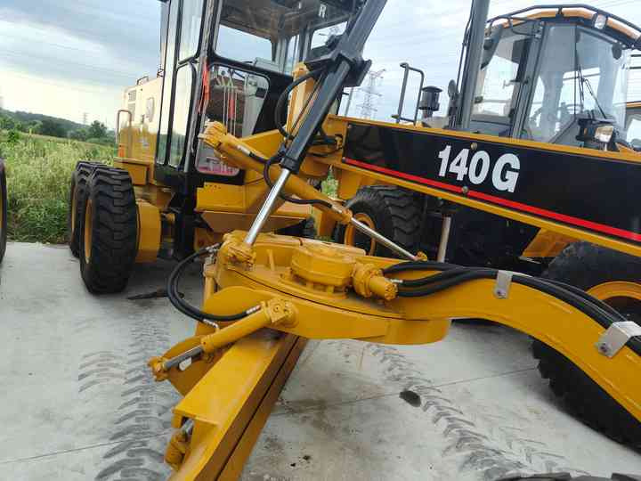 Used Construction Machinery Caterpillar 140G Grader Cat140G Wheeled Grader Cheap Price Hot Sale - Grejder: slika Used Construction Machinery Caterpillar 140G Grader Cat140G Wheeled Grader Cheap Price Hot Sale - Grejder Used Construction Machinery Caterpillar 140G Grader Cat140G Wheeled Grader Cheap Price Hot Sale - Grejder: slika Used Construction Machinery Caterpillar 140G Grader Cat140G Wheeled Grader Cheap Price Hot Sale - Grejder