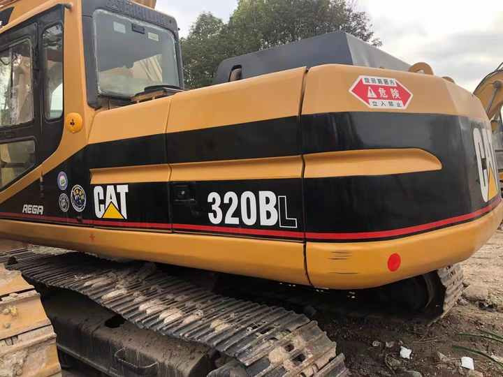 Used Digger CAT 320BL Construction Machinery Construction Digger Used CAT 320BL Cheap Excavator - Bager gusjeničar: slika Used Digger CAT 320BL Construction Machinery Construction Digger Used CAT 320BL Cheap Excavator - Bager gusjeničar Used Digger CAT 320BL Construction Machinery Construction Digger Used CAT 320BL Cheap Excavator - Bager gusjeničar: slika Used Digger CAT 320BL Construction Machinery Construction Digger Used CAT 320BL Cheap Excavator - Bager gusjeničar