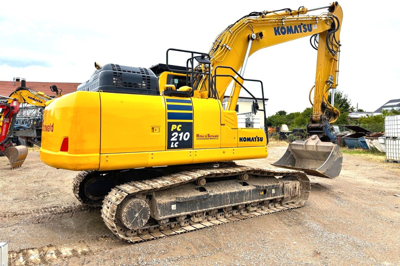 Komatsu PC210LC-11E0 - Bager gusjeničar: slika  Komatsu PC210LC-11E0 - Bager gusjeničar Komatsu PC210LC-11E0 - Bager gusjeničar: slika  Komatsu PC210LC-11E0 - Bager gusjeničar