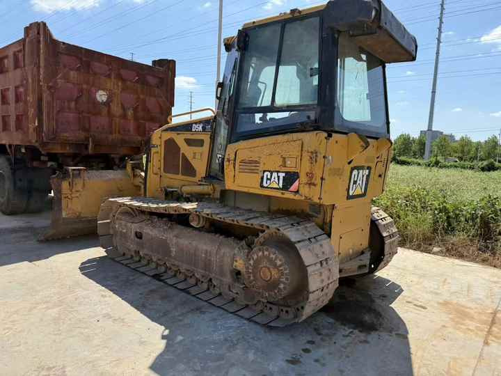 100% Original Caterpillar D5K Mini Track Dozer Cat D5K Bulldozer Superior Performance Running Working Condition Hot Sale - Buldožer: slika 100% Original Caterpillar D5K Mini Track Dozer Cat D5K Bulldozer Superior Performance Running Working Condition Hot Sale - Buldožer 100% Original Caterpillar D5K Mini Track Dozer Cat D5K Bulldozer Superior Performance Running Working Condition Hot Sale - Buldožer: slika 100% Original Caterpillar D5K Mini Track Dozer Cat D5K Bulldozer Superior Performance Running Working Condition Hot Sale - Buldožer