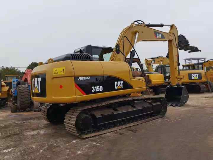 15tons Excavator Used Caterpillar CAT315D 315D2GC Hydraulic Crawler Secondhand Digger Machine Excavadora Cater - Bager: slika 15tons Excavator Used Caterpillar CAT315D 315D2GC Hydraulic Crawler Secondhand Digger Machine Excavadora Cater - Bager 15tons Excavator Used Caterpillar CAT315D 315D2GC Hydraulic Crawler Secondhand Digger Machine Excavadora Cater - Bager: slika 15tons Excavator Used Caterpillar CAT315D 315D2GC Hydraulic Crawler Secondhand Digger Machine Excavadora Cater - Bager