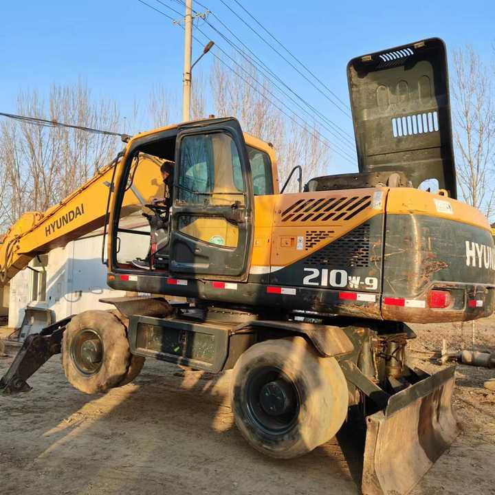 Second Hand Original Korea Brand hyundai 210-9 Wheel Excavator Hot Sale - Bager: slika Second Hand Original Korea Brand hyundai 210-9 Wheel Excavator Hot Sale - Bager Second Hand Original Korea Brand hyundai 210-9 Wheel Excavator Hot Sale - Bager: slika Second Hand Original Korea Brand hyundai 210-9 Wheel Excavator Hot Sale - Bager