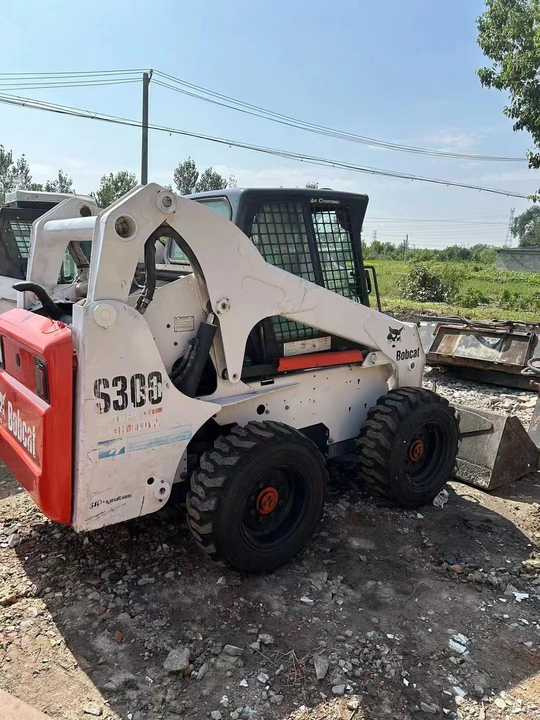 Used Bob Cat Bob Cat S300 Used Skid Steer Wheel Loader Multifunctional Track Loaders Bobcat - Mini utovarivač: slika Used Bob Cat Bob Cat S300 Used Skid Steer Wheel Loader Multifunctional Track Loaders Bobcat - Mini utovarivač Used Bob Cat Bob Cat S300 Used Skid Steer Wheel Loader Multifunctional Track Loaders Bobcat - Mini utovarivač: slika Used Bob Cat Bob Cat S300 Used Skid Steer Wheel Loader Multifunctional Track Loaders Bobcat - Mini utovarivač