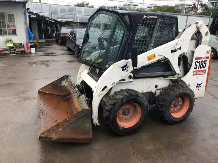 Used BobCat Bob Cat S185 Used Mini Skid Steer Wheel Loader Multifunctional Track Loaders Bobcat - Mini utovarivač: slika Used BobCat Bob Cat S185 Used Mini Skid Steer Wheel Loader Multifunctional Track Loaders Bobcat - Mini utovarivač Used BobCat Bob Cat S185 Used Mini Skid Steer Wheel Loader Multifunctional Track Loaders Bobcat - Mini utovarivač: slika Used BobCat Bob Cat S185 Used Mini Skid Steer Wheel Loader Multifunctional Track Loaders Bobcat - Mini utovarivač
