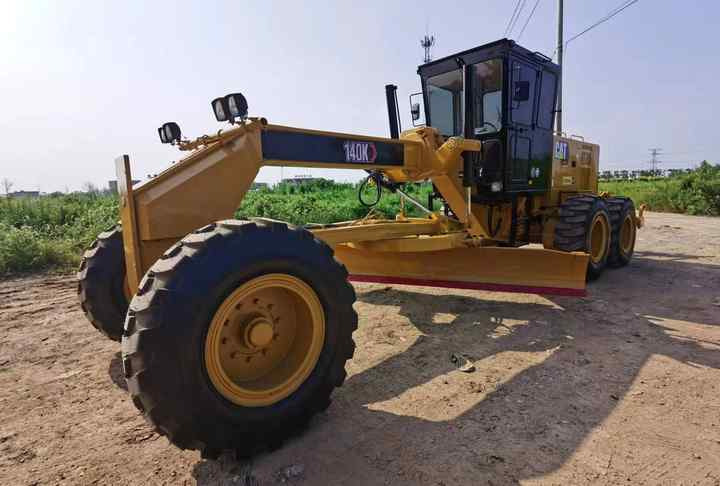 Grejder Used Caterpillar CAT 140k Land Road Motor Grader CAT140k Used Grader Cheap Price for Sale: slika Grejder Used Caterpillar CAT 140k Land Road Motor Grader CAT140k Used Grader Cheap Price for Sale