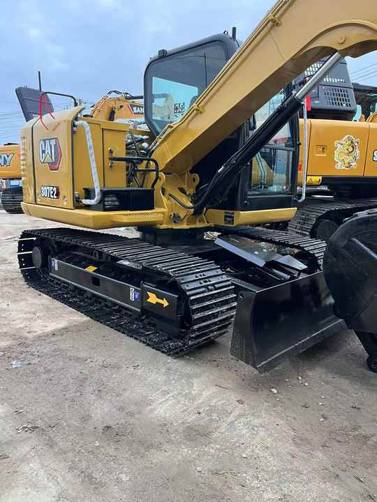 Used Caterpillar CAT 307E2 Crawler Mini Hydraulic Digger Second Hand Cat 307E2 Excavator - Bager: slika Used Caterpillar CAT 307E2 Crawler Mini Hydraulic Digger Second Hand Cat 307E2 Excavator - Bager Used Caterpillar CAT 307E2 Crawler Mini Hydraulic Digger Second Hand Cat 307E2 Excavator - Bager: slika Used Caterpillar CAT 307E2 Crawler Mini Hydraulic Digger Second Hand Cat 307E2 Excavator - Bager