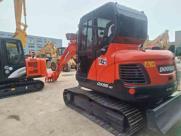 Used Digger DOOSAN DX55 Construction Machinery Construction Digger Used DOOSAN DX55 Cheap Excavator - Bager gusjeničar: slika Used Digger DOOSAN DX55 Construction Machinery Construction Digger Used DOOSAN DX55 Cheap Excavator - Bager gusjeničar Used Digger DOOSAN DX55 Construction Machinery Construction Digger Used DOOSAN DX55 Cheap Excavator - Bager gusjeničar: slika Used Digger DOOSAN DX55 Construction Machinery Construction Digger Used DOOSAN DX55 Cheap Excavator - Bager gusjeničar