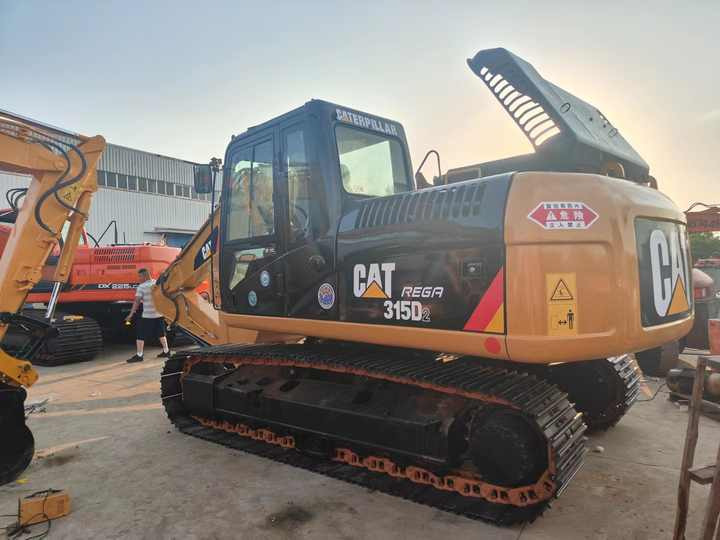 Used Excavator Caterpillar CAT315D Small and Medium-sized Original 15 Ton Excavator CAT315D for Sale - Bager gusjeničar: slika Used Excavator Caterpillar CAT315D Small and Medium-sized Original 15 Ton Excavator CAT315D for Sale - Bager gusjeničar Used Excavator Caterpillar CAT315D Small and Medium-sized Original 15 Ton Excavator CAT315D for Sale - Bager gusjeničar: slika Used Excavator Caterpillar CAT315D Small and Medium-sized Original 15 Ton Excavator CAT315D for Sale - Bager gusjeničar