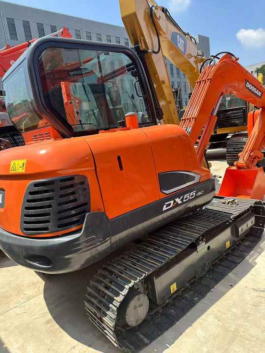 Used Excavator Doosan DX55 Excavators Mini Equipment Earth Moving Machinery Doosan Digger Excavator for Sale - Bager gusjeničar: slika Used Excavator Doosan DX55 Excavators Mini Equipment Earth Moving Machinery Doosan Digger Excavator for Sale - Bager gusjeničar Used Excavator Doosan DX55 Excavators Mini Equipment Earth Moving Machinery Doosan Digger Excavator for Sale - Bager gusjeničar: slika Used Excavator Doosan DX55 Excavators Mini Equipment Earth Moving Machinery Doosan Digger Excavator for Sale - Bager gusjeničar
