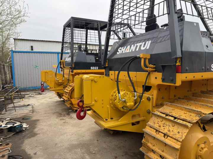 Used Shantui SD22 New Model Bulldozer Second Hand Machine Popular Brand Shantui Hydraulic Machinery - Buldožer: slika Used Shantui SD22 New Model Bulldozer Second Hand Machine Popular Brand Shantui Hydraulic Machinery - Buldožer Used Shantui SD22 New Model Bulldozer Second Hand Machine Popular Brand Shantui Hydraulic Machinery - Buldožer: slika Used Shantui SD22 New Model Bulldozer Second Hand Machine Popular Brand Shantui Hydraulic Machinery - Buldožer