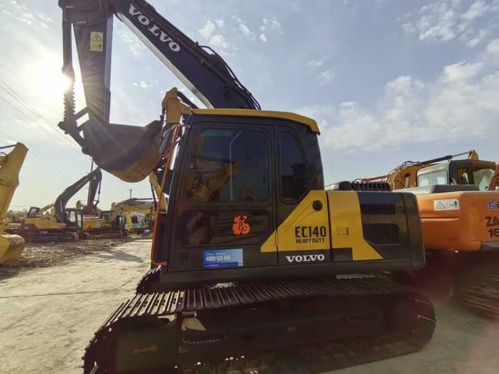 Used Volvo 14 tonne crawler excavator Volvo ec140 excavator powerful low price good quality for sale - Bager gusjeničar: slika Used Volvo 14 tonne crawler excavator Volvo ec140 excavator powerful low price good quality for sale - Bager gusjeničar Used Volvo 14 tonne crawler excavator Volvo ec140 excavator powerful low price good quality for sale - Bager gusjeničar: slika Used Volvo 14 tonne crawler excavator Volvo ec140 excavator powerful low price good quality for sale - Bager gusjeničar