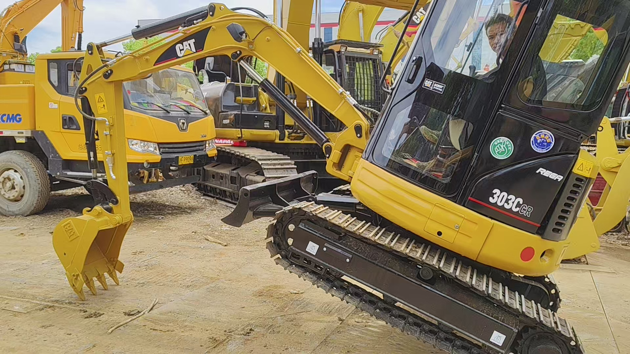 CATERPILLAR 303C - Mini bager: slika CATERPILLAR 303C - Mini bager CATERPILLAR 303C - Mini bager: slika CATERPILLAR 303C - Mini bager