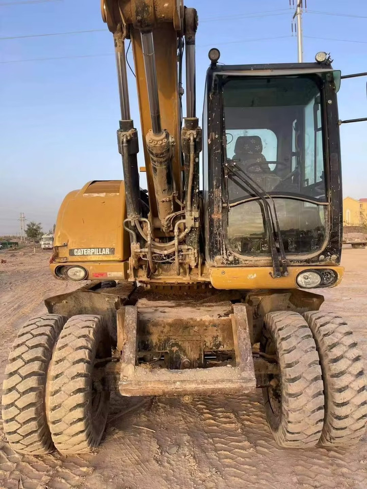 CATERPILLAR M315 - Bager na kotačima: slika CATERPILLAR M315 - Bager na kotačima CATERPILLAR M315 - Bager na kotačima: slika CATERPILLAR M315 - Bager na kotačima