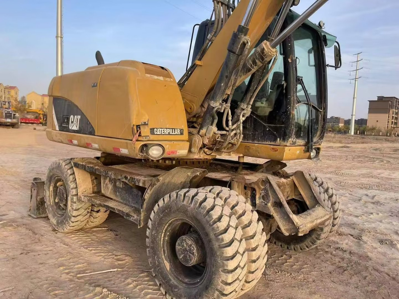 CATERPILLAR M315 - Bager na kotačima: slika CATERPILLAR M315 - Bager na kotačima CATERPILLAR M315 - Bager na kotačima: slika CATERPILLAR M315 - Bager na kotačima