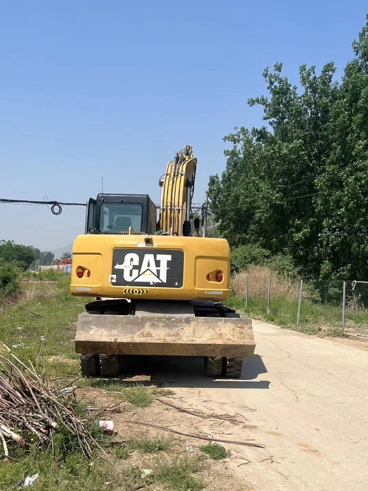 CATERPILLAR M317 - Bager na kotačima: slika CATERPILLAR M317 - Bager na kotačima CATERPILLAR M317 - Bager na kotačima: slika CATERPILLAR M317 - Bager na kotačima