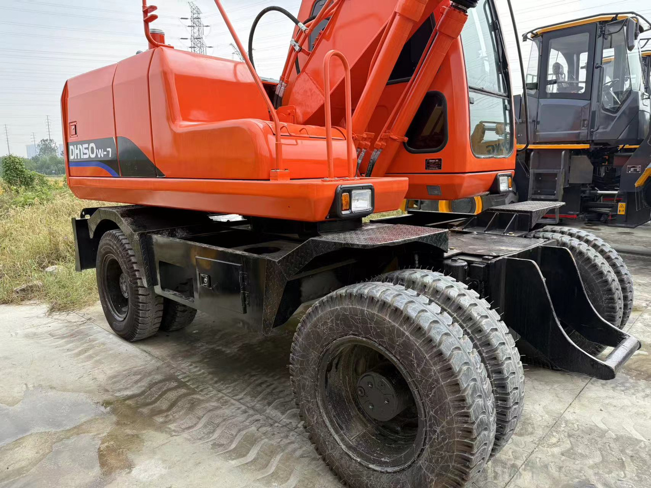 DOOSAN DH150W-7 - Bager na kotačima: slika DOOSAN DH150W-7 - Bager na kotačima DOOSAN DH150W-7 - Bager na kotačima: slika DOOSAN DH150W-7 - Bager na kotačima