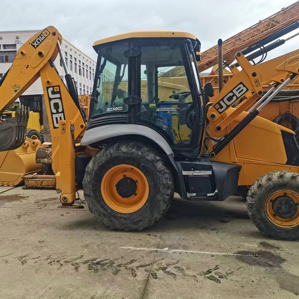 JCB 3CX - Rovokopač-utovarivač: slika JCB 3CX - Rovokopač-utovarivač JCB 3CX - Rovokopač-utovarivač: slika JCB 3CX - Rovokopač-utovarivač