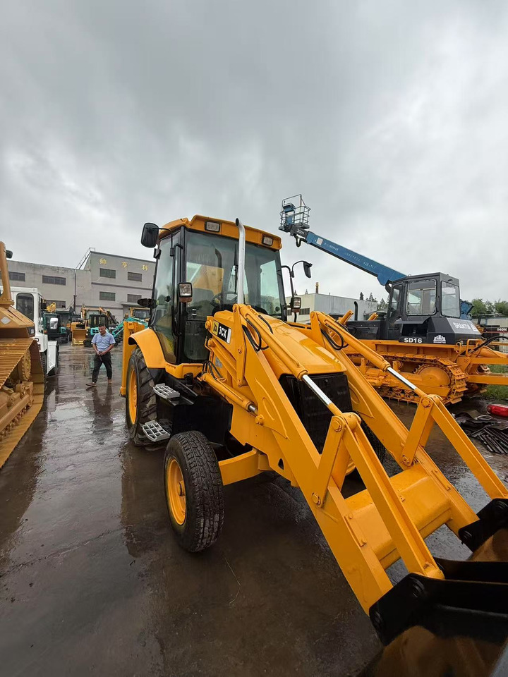 JCB 3CX - Rovokopač-utovarivač: slika JCB 3CX - Rovokopač-utovarivač JCB 3CX - Rovokopač-utovarivač: slika JCB 3CX - Rovokopač-utovarivač
