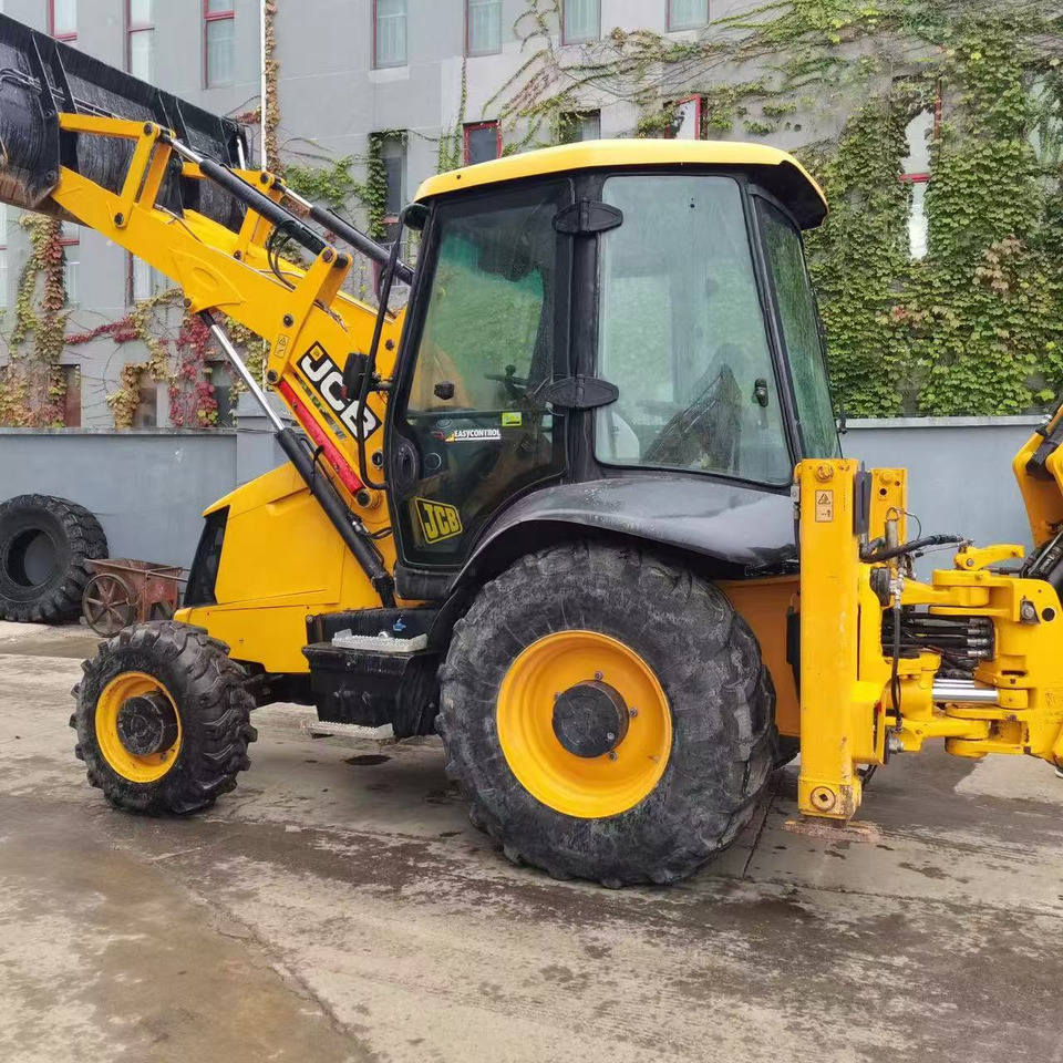JCB 3CX - Rovokopač-utovarivač: slika JCB 3CX - Rovokopač-utovarivač JCB 3CX - Rovokopač-utovarivač: slika JCB 3CX - Rovokopač-utovarivač
