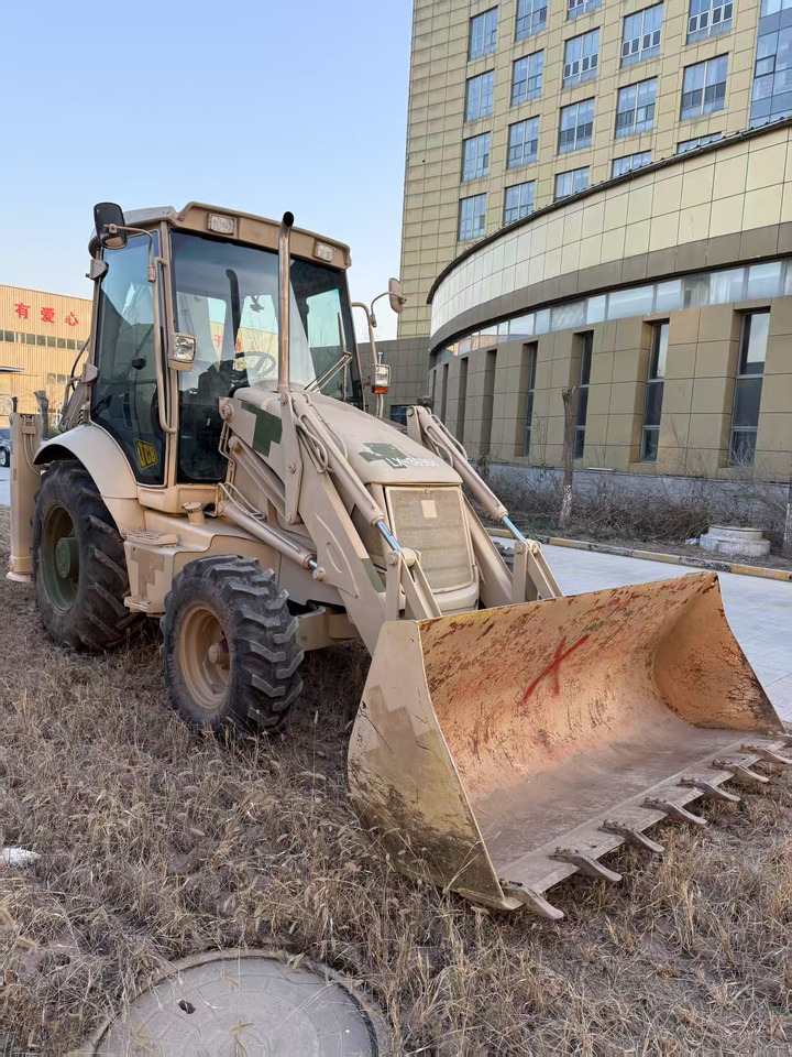 JCB 3CX - Rovokopač-utovarivač: slika JCB 3CX - Rovokopač-utovarivač JCB 3CX - Rovokopač-utovarivač: slika JCB 3CX - Rovokopač-utovarivač