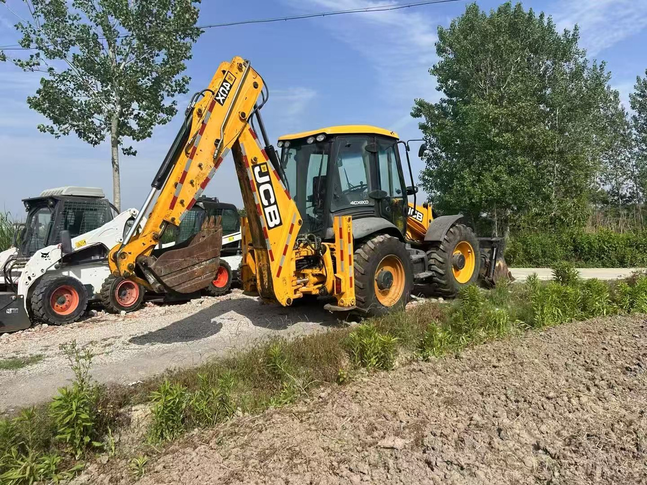 JCB 4CX - Rovokopač-utovarivač: slika JCB 4CX - Rovokopač-utovarivač JCB 4CX - Rovokopač-utovarivač: slika JCB 4CX - Rovokopač-utovarivač