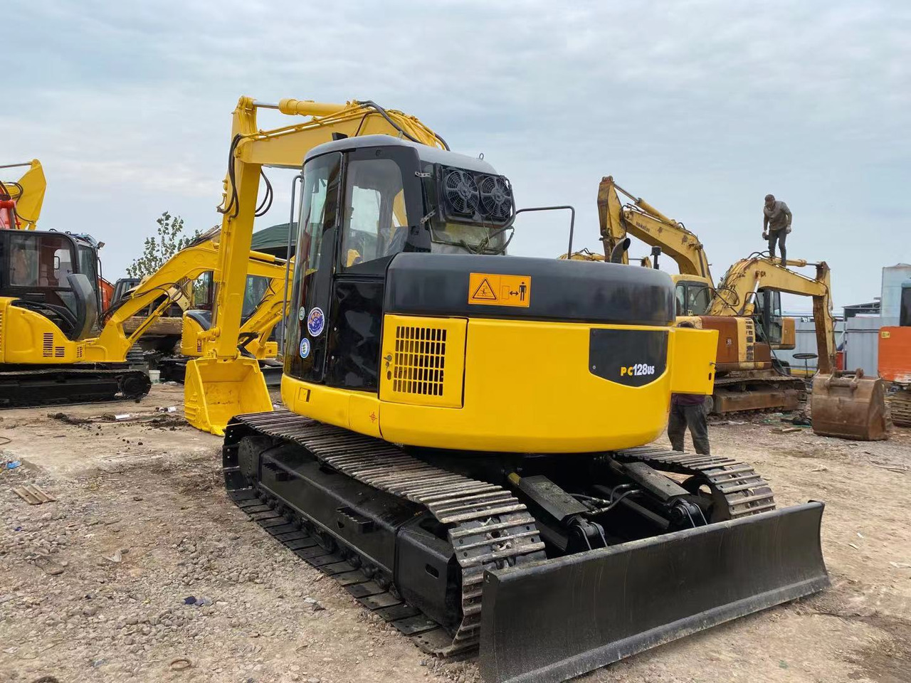 KOMATSU PC128US - Bager gusjeničar: slika KOMATSU PC128US - Bager gusjeničar KOMATSU PC128US - Bager gusjeničar: slika KOMATSU PC128US - Bager gusjeničar
