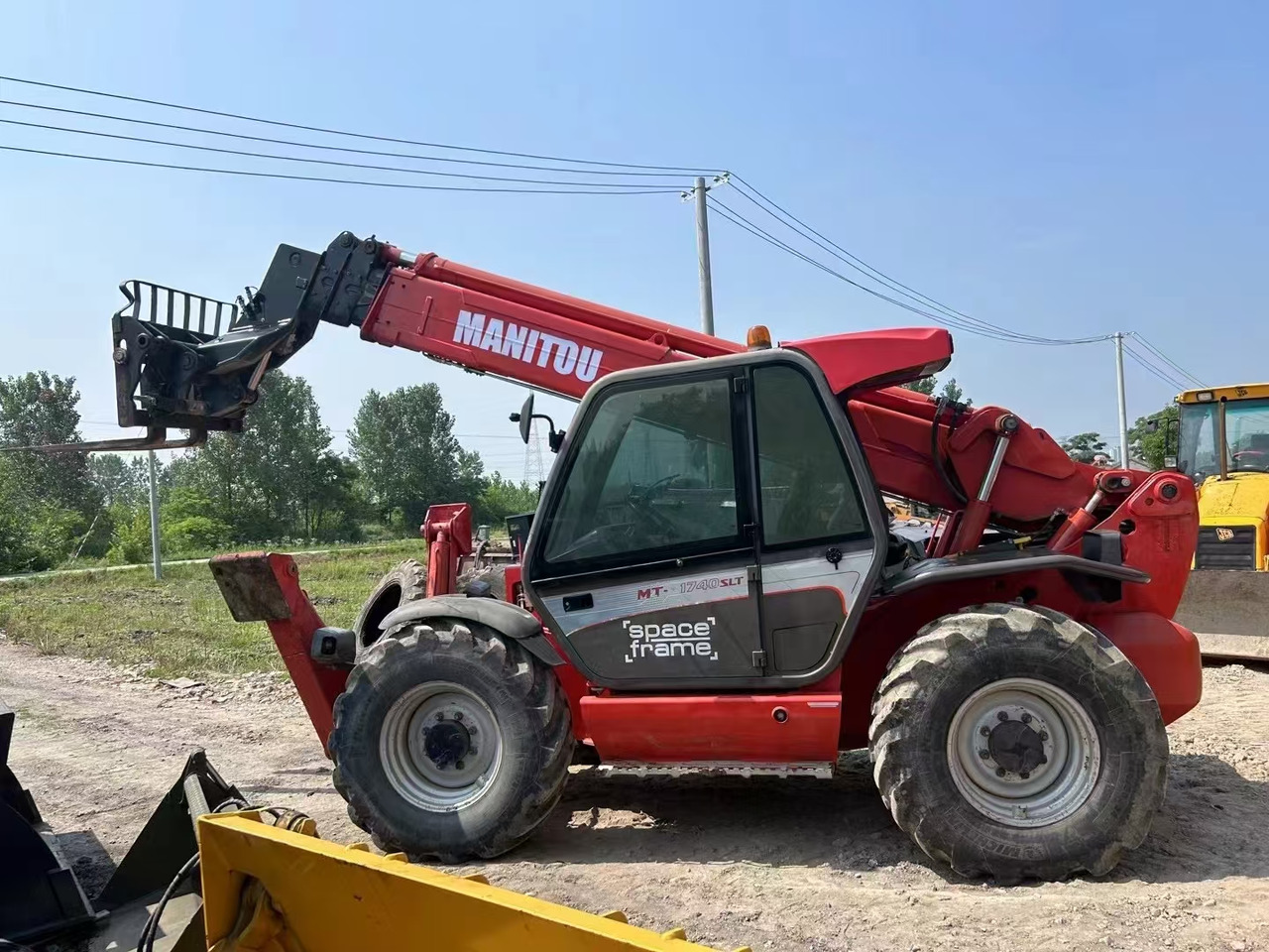 MANITOU MT1740SLT - Teleskopski rukovatelj: slika MANITOU MT1740SLT - Teleskopski rukovatelj MANITOU MT1740SLT - Teleskopski rukovatelj: slika MANITOU MT1740SLT - Teleskopski rukovatelj