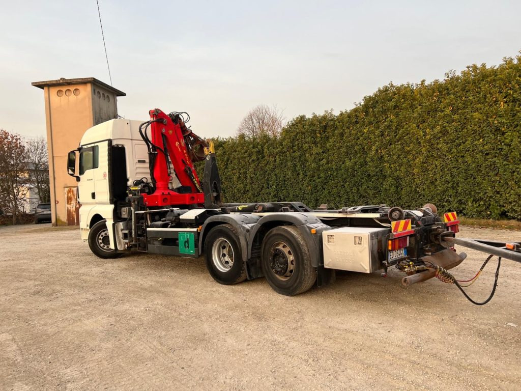 MAN TGX 26.440 SCARRABILE CON GRU - Kamion s kukastom dizalicom: slika MAN TGX 26.440 SCARRABILE CON GRU - Kamion s kukastom dizalicom MAN TGX 26.440 SCARRABILE CON GRU - Kamion s kukastom dizalicom: slika MAN TGX 26.440 SCARRABILE CON GRU - Kamion s kukastom dizalicom