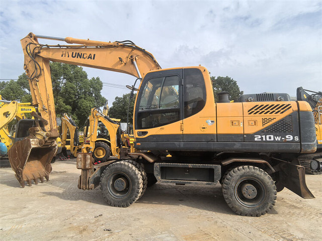 Hyundai R210W-9S - Bager na kotačima: slika Hyundai R210W-9S - Bager na kotačima Hyundai R210W-9S - Bager na kotačima: slika Hyundai R210W-9S - Bager na kotačima