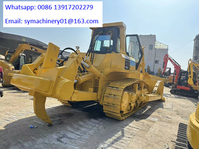 Komatsu D155A-5 - Buldožer: slika Komatsu D155A-5 - Buldožer Komatsu D155A-5 - Buldožer: slika Komatsu D155A-5 - Buldožer