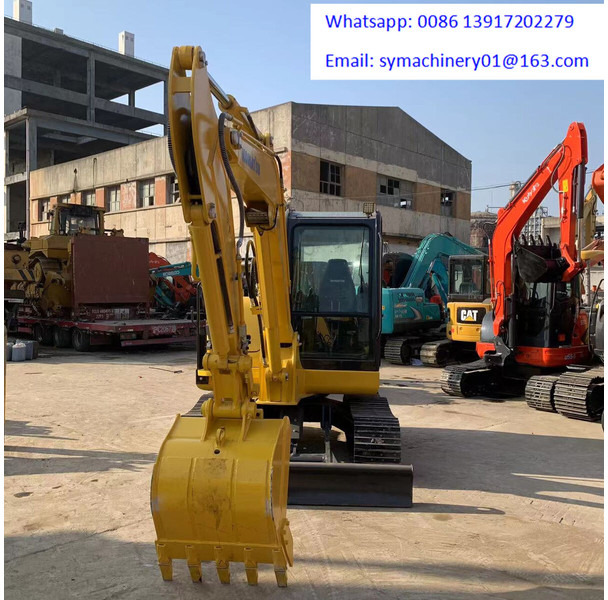 Komatsu PC56-7 - Mini bager: slika Komatsu PC56-7 - Mini bager Komatsu PC56-7 - Mini bager: slika Komatsu PC56-7 - Mini bager