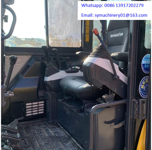 Komatsu PC56-7 - Mini bager: slika Komatsu PC56-7 - Mini bager Komatsu PC56-7 - Mini bager: slika Komatsu PC56-7 - Mini bager