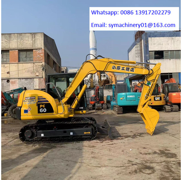 Komatsu PC60-8 - Mini bager: slika Komatsu PC60-8 - Mini bager Komatsu PC60-8 - Mini bager: slika Komatsu PC60-8 - Mini bager