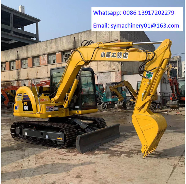 Komatsu PC60-8 - Mini bager: slika Komatsu PC60-8 - Mini bager Komatsu PC60-8 - Mini bager: slika Komatsu PC60-8 - Mini bager
