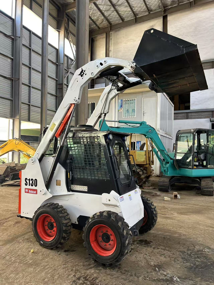 BOBCAT S130 Skid Steer Loader Click for Discount - Mini utovarivač: slika BOBCAT S130 Skid Steer Loader Click for Discount - Mini utovarivač BOBCAT S130 Skid Steer Loader Click for Discount - Mini utovarivač: slika BOBCAT S130 Skid Steer Loader Click for Discount - Mini utovarivač