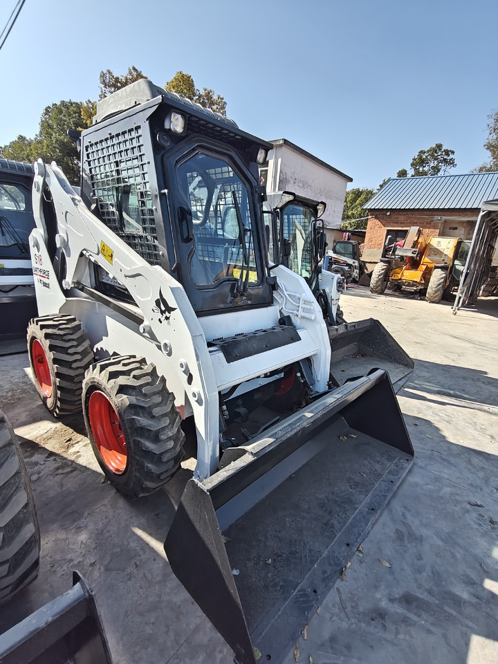 BOBCAT S18 Skid Steer Loader Click for Disconunt - Mini utovarivač: slika BOBCAT S18 Skid Steer Loader Click for Disconunt - Mini utovarivač BOBCAT S18 Skid Steer Loader Click for Disconunt - Mini utovarivač: slika BOBCAT S18 Skid Steer Loader Click for Disconunt - Mini utovarivač