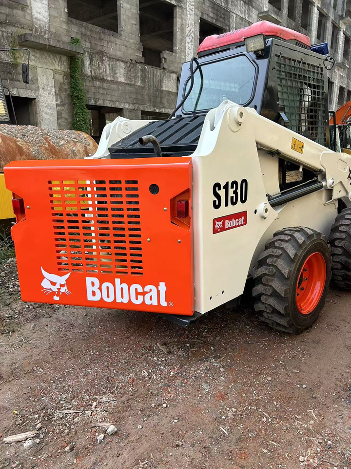 BOBCAT Skid Steer Loader S130 - Mini utovarivač: slika BOBCAT Skid Steer Loader S130 - Mini utovarivač BOBCAT Skid Steer Loader S130 - Mini utovarivač: slika BOBCAT Skid Steer Loader S130 - Mini utovarivač